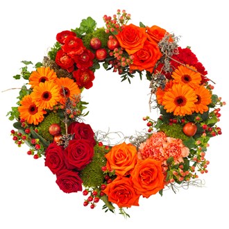 Funeral wreath in red and orange colours.